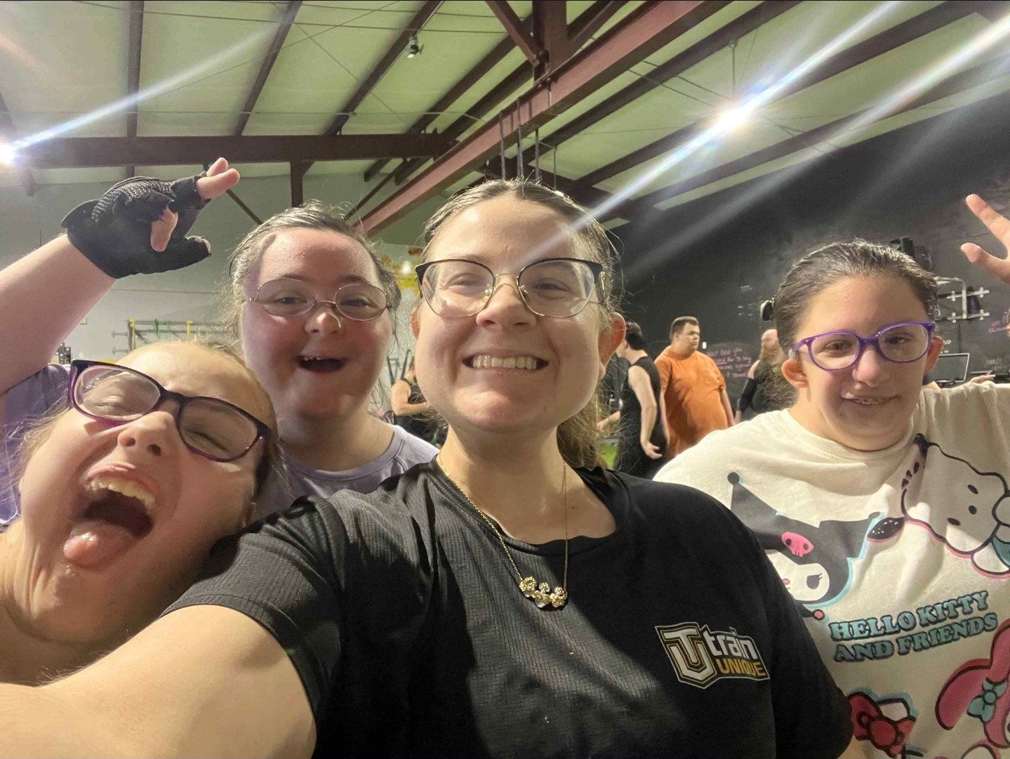 Emily's selfie with three of her athletes on the Lafayette floor