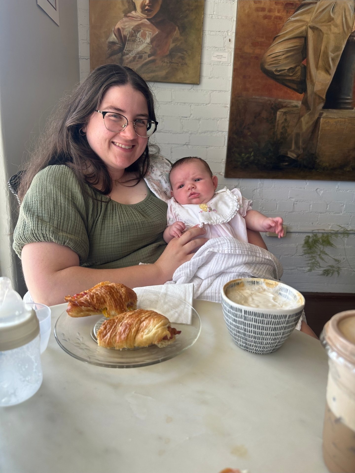 Emily with Ruth at a caf&eacute; table