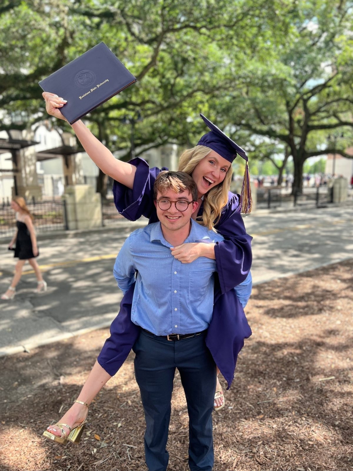 Linden celebrating her LSU kinesiology degree