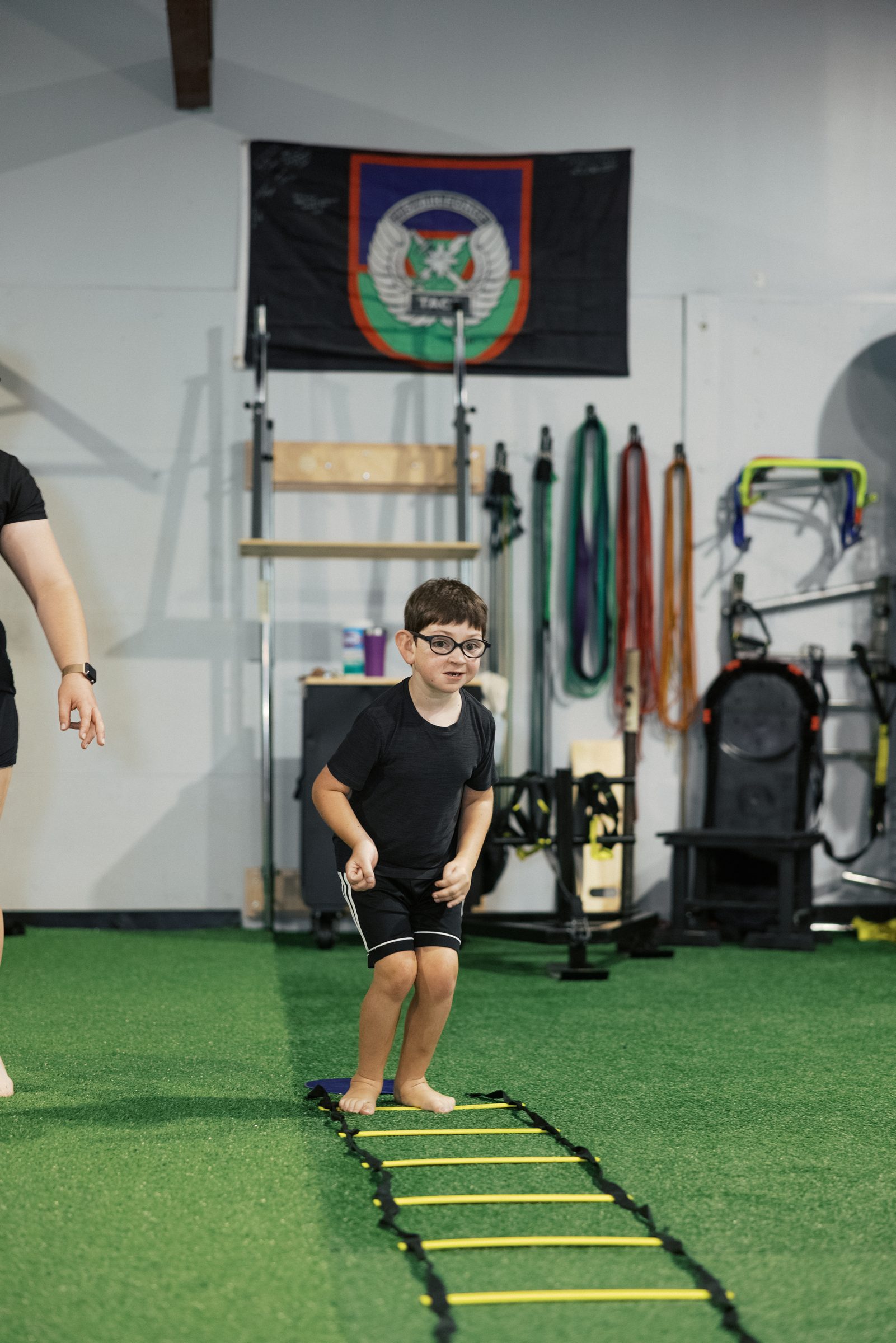 A young athlete working the agility ladder