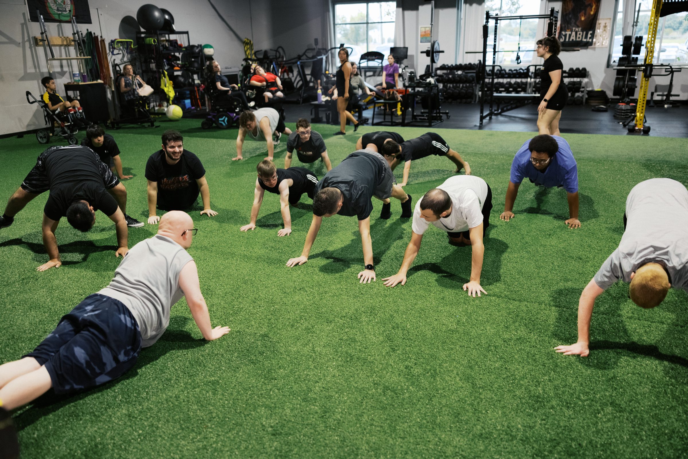 The class moving across the turf together